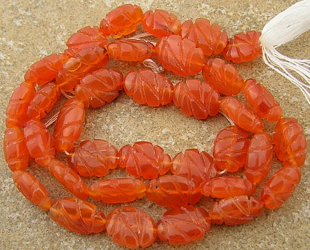 Carnelian carved oval 10x7mm beads 16 strand G112  